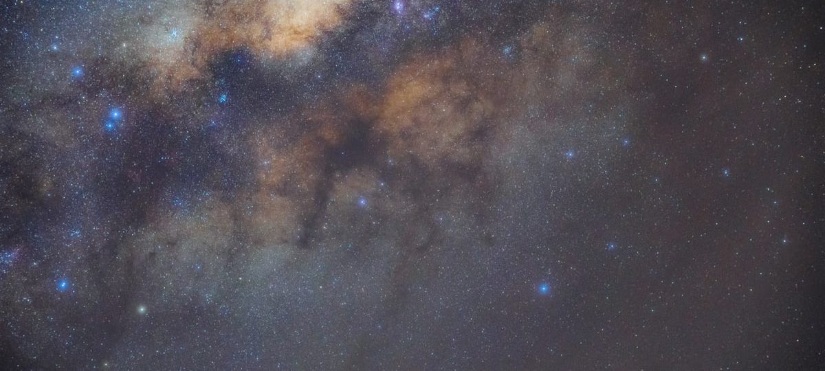 Captivating image of the Milky Way Galaxy illuminating the night sky with vibrant stars and cosmic clouds.
